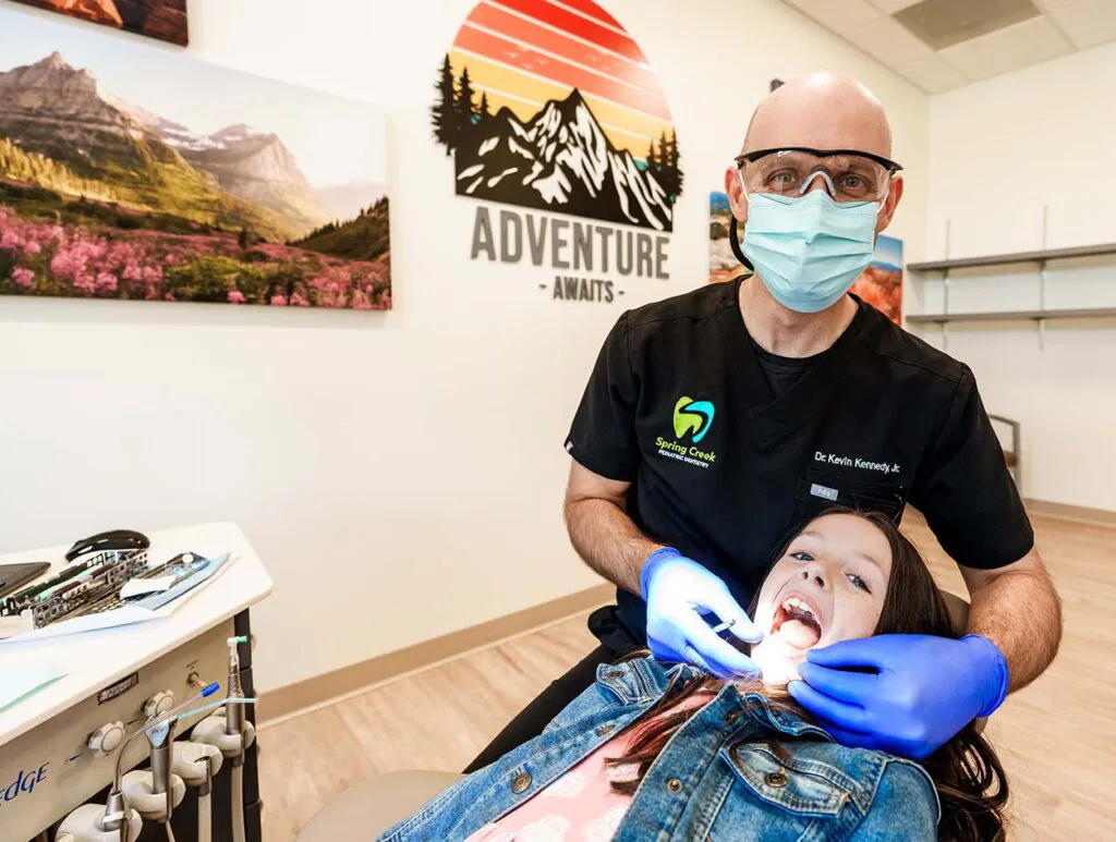 Girl getting teeth cleaned